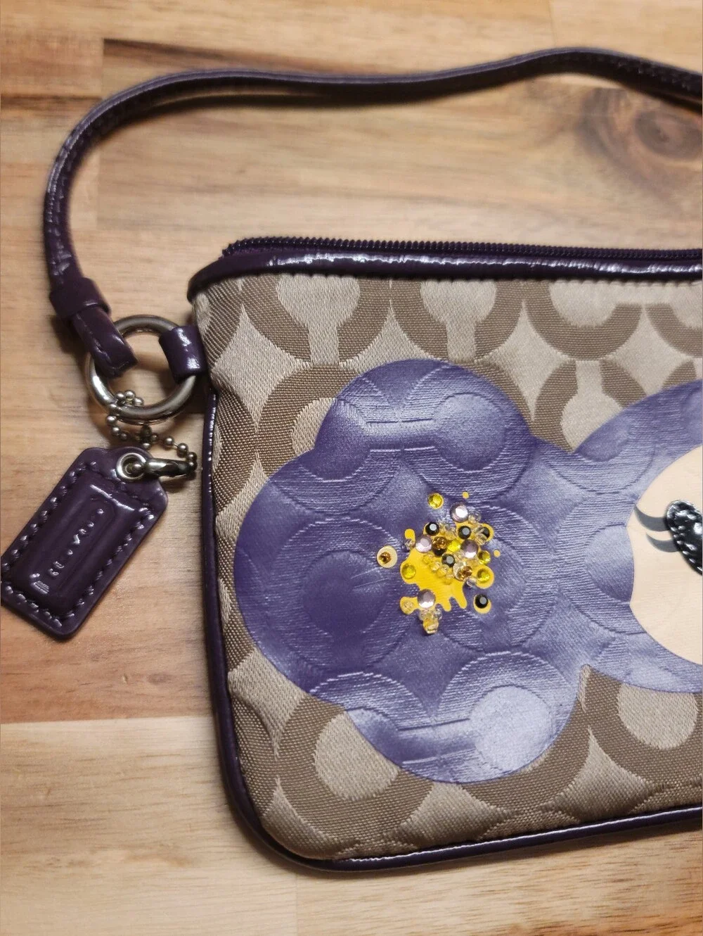 Coach Purple Floral Character Zip Wristlet